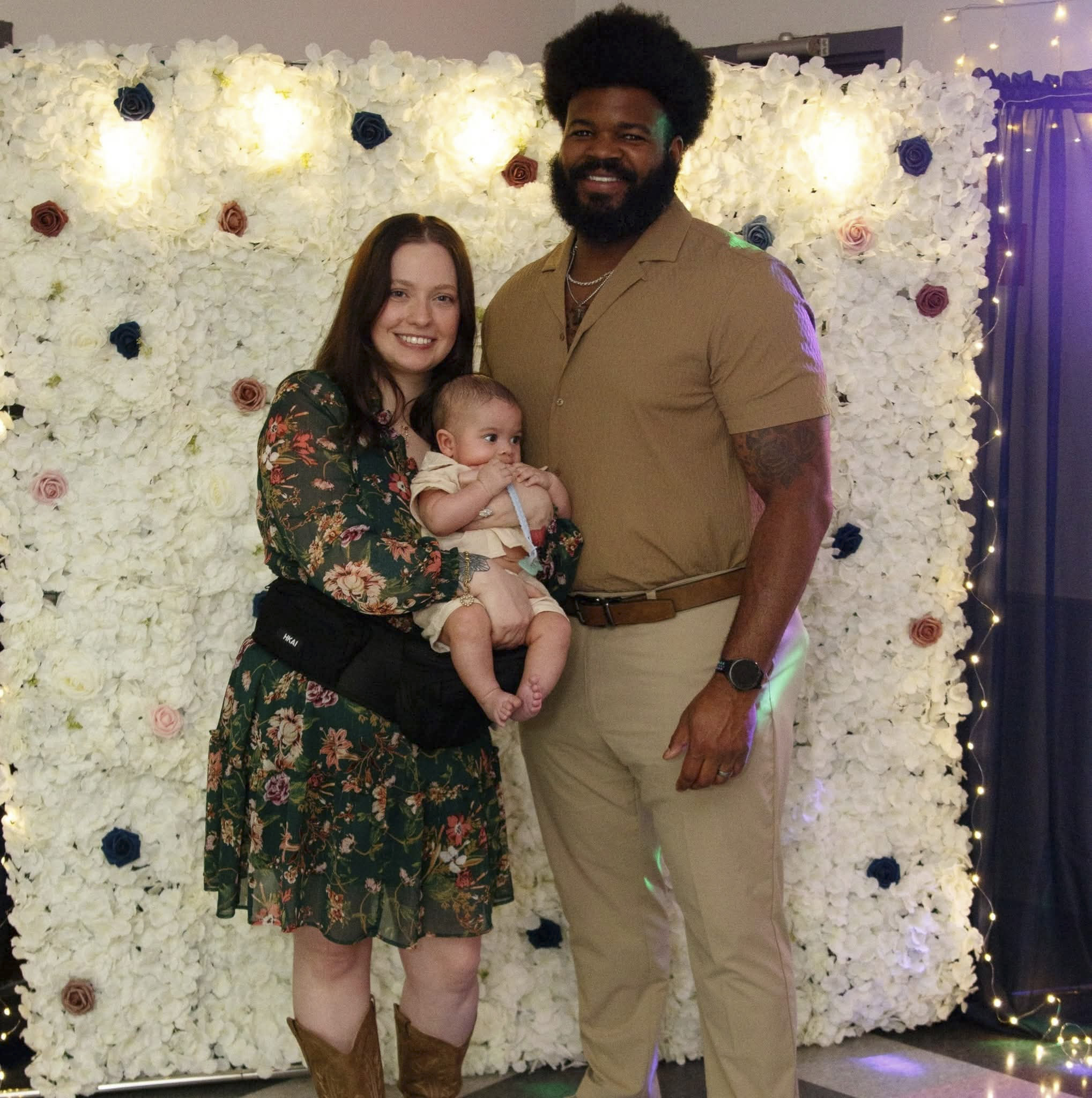 AJ with his wife Krysta and son Mateo